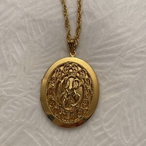 Gold color necklace with design